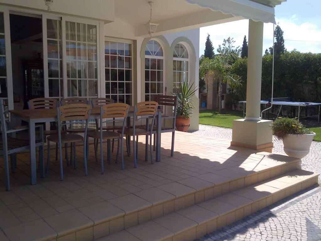 Table and chairs on the patio by an Algarve villa
