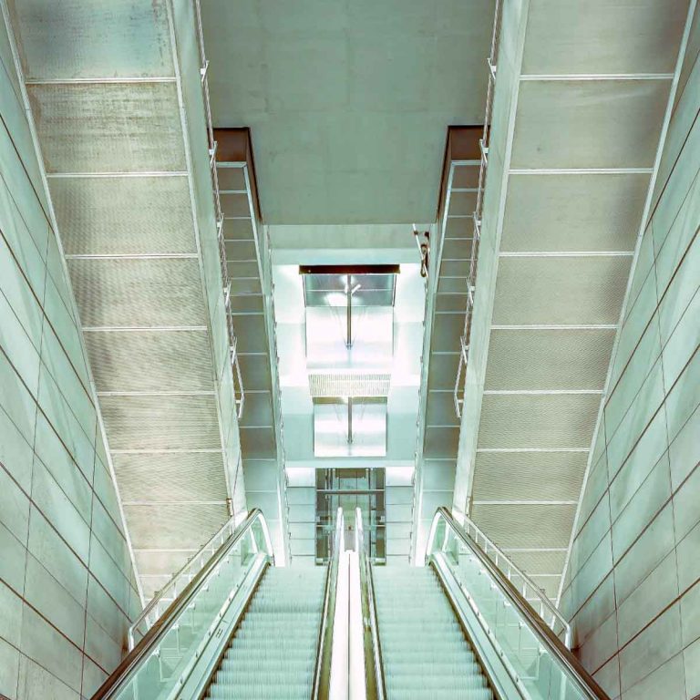A view of the escalators in Copenhagen's metro - tips for using Copenhagen metro with kids