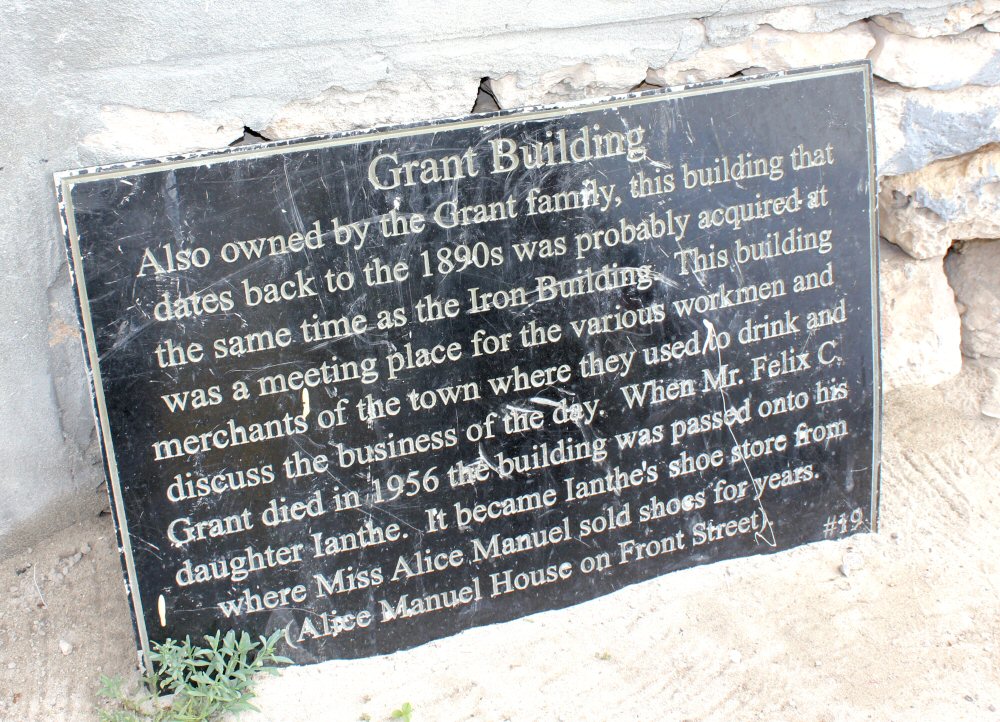 Plaque with details of a historic building in Grand Turk - our day on the island and discovering the Grand Turk shipwreck