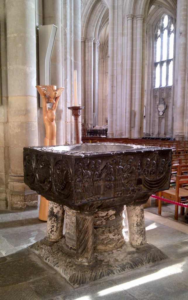 Carved stone font at Winchester cathedral