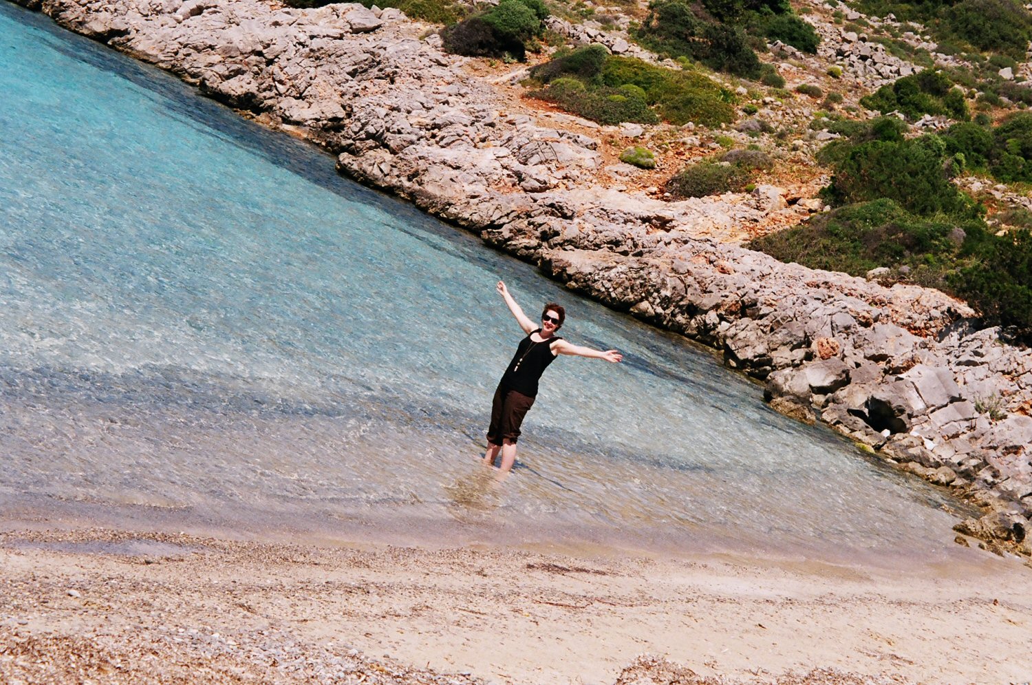Stumbling across the clear waters of a tiny cove during our one day in Chios