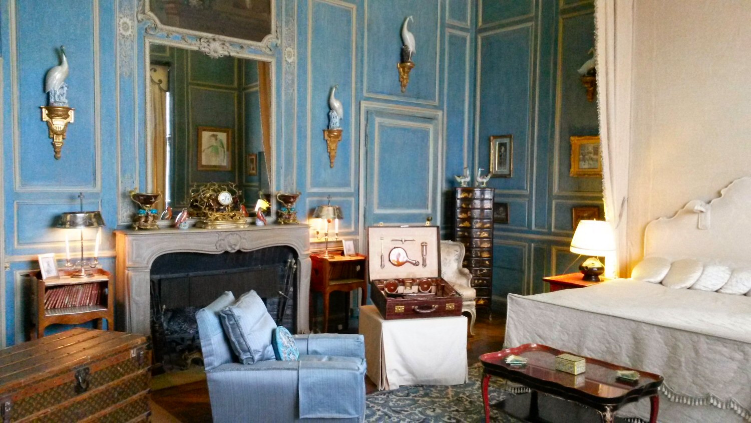 One of the bedrooms decorated in blue at Leeds Castle - discovering Leeds castle facts and meeting the Leeds Castle peacocks in Kent