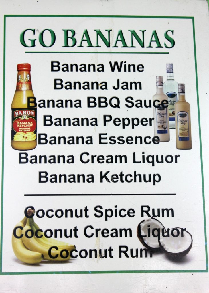 Sign for various banana products on sale in St Lucia including Banana wine and Banana ketchup