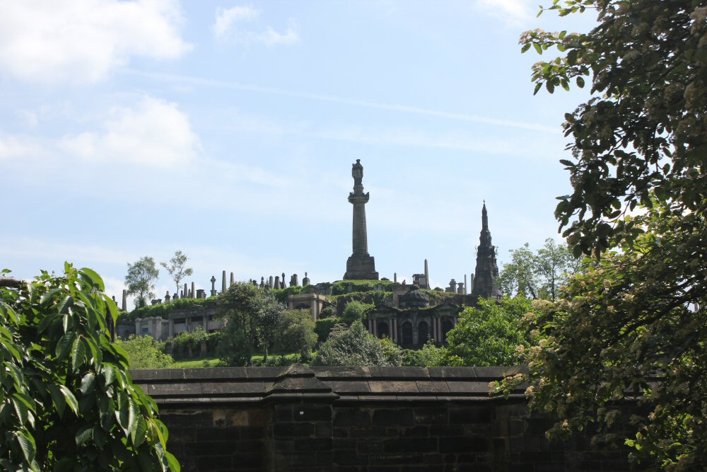 The necropolis overlooking Glasgow cathedral, against a blue sky