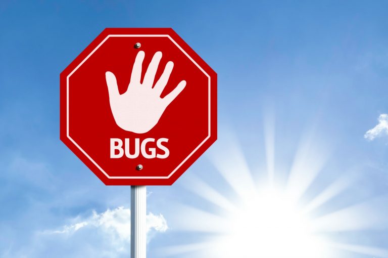 Red sign showing a hand and the word bugs - would you use deet on a child?