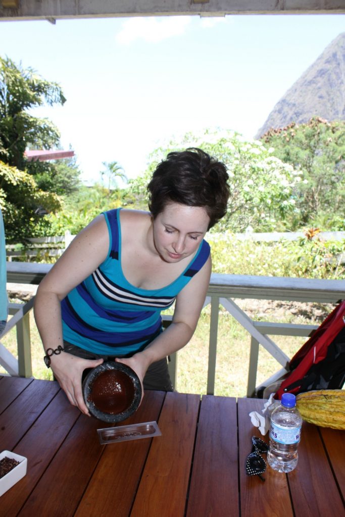 Grinding beans to make chocolate - discovering the history of chocolate in St Lucia and how to make it