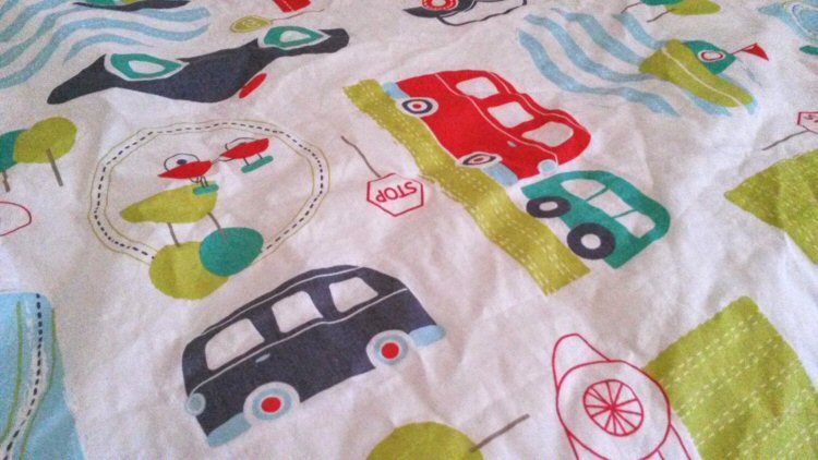 Close up of the transport themed design on my daughters duvet - my Gro to Bed review of this toddler bedding
