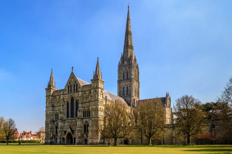 View of Salisbury cathedral in the UK against a blue sky - ideas for a visit to Salisbury with kids
