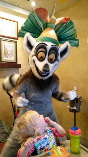 My toddler daughter with King Julien from the movie Madagascar in one of the Oasis of the Seas restaurants, discovering a cruise ship with a toddler