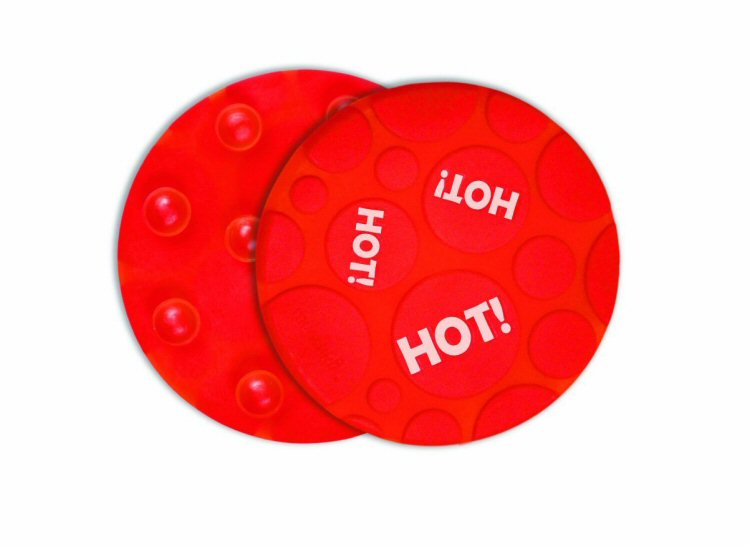 Red non-slip Munchkin grippy bath dots reading HOT!
