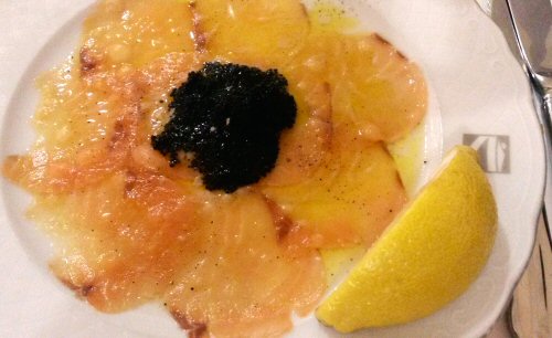 Smoked salmon in a circle with lemon wedge at the Portofino restaurant at the Gran Castillo hotel in Lanzarote