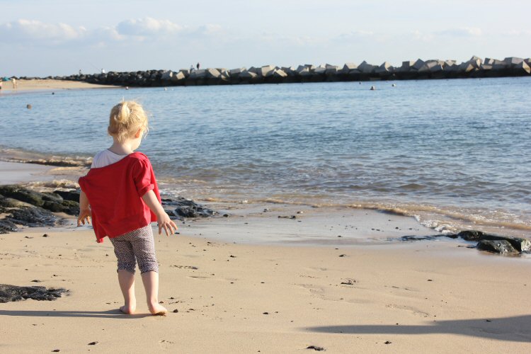 My toddler daughter on the beach in Lanzarote