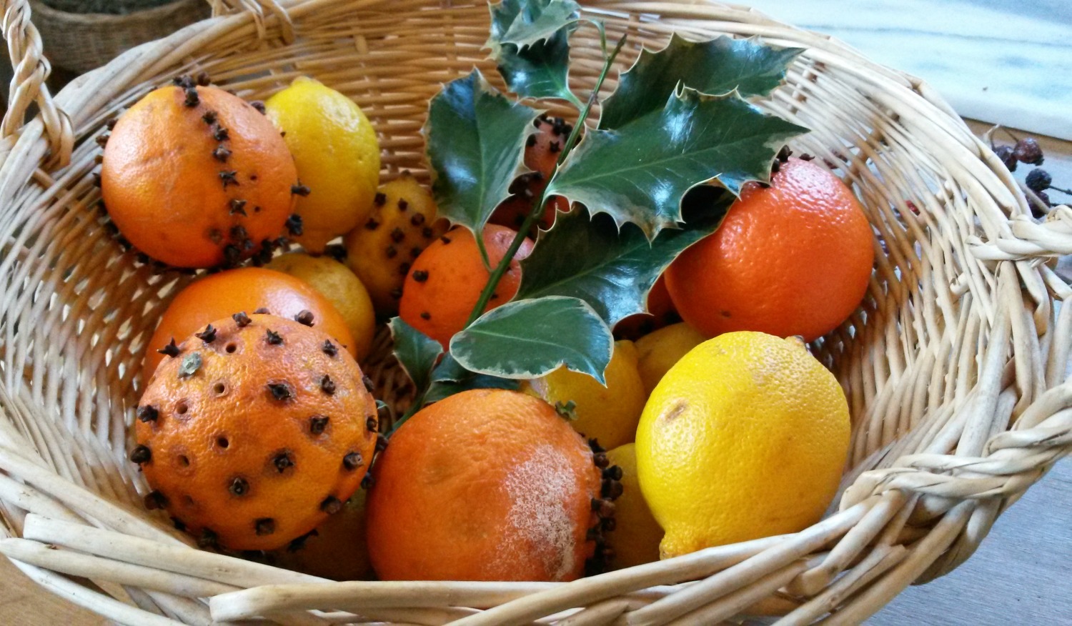 Citrus fruit including oranges studded with cloves in the still room of Ham House in Surrey