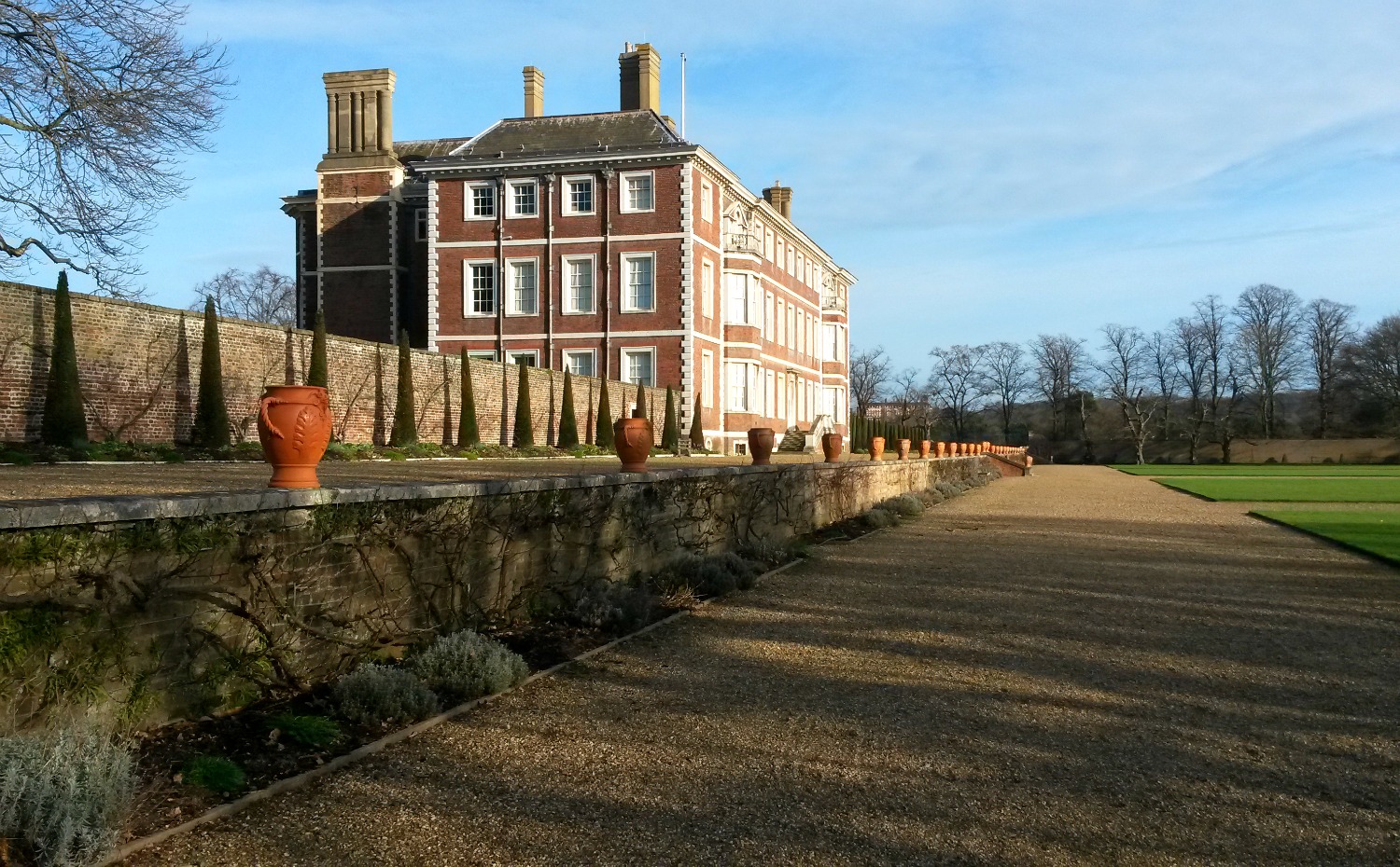 Rear exterior view of the grand red brick Ham House - one of my favourite days out in Surrey with kids