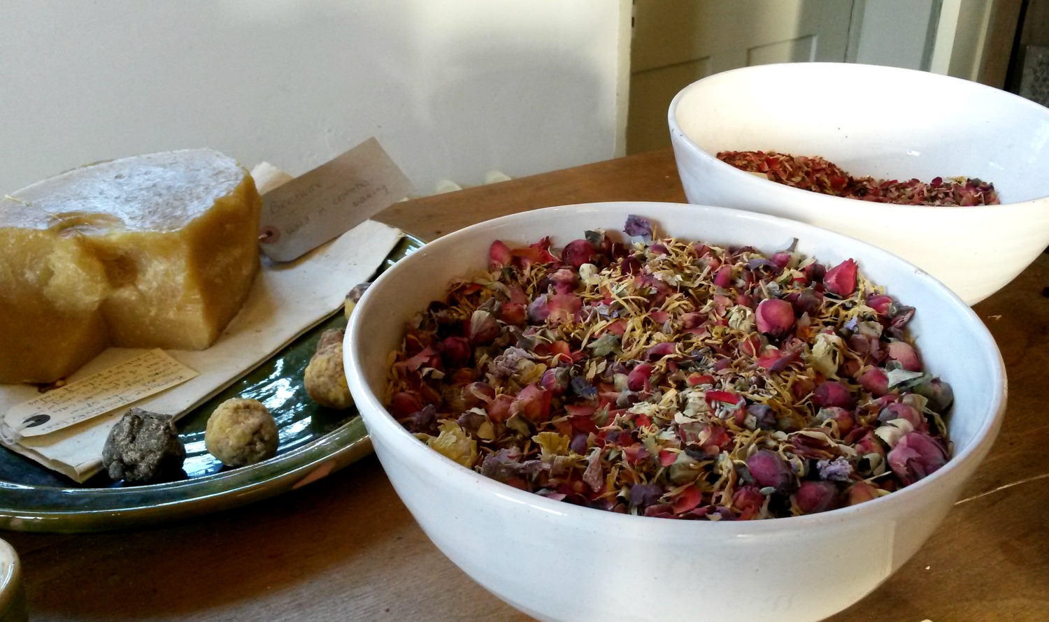 A bowl of herbs in the still room of Ham House in Surrey