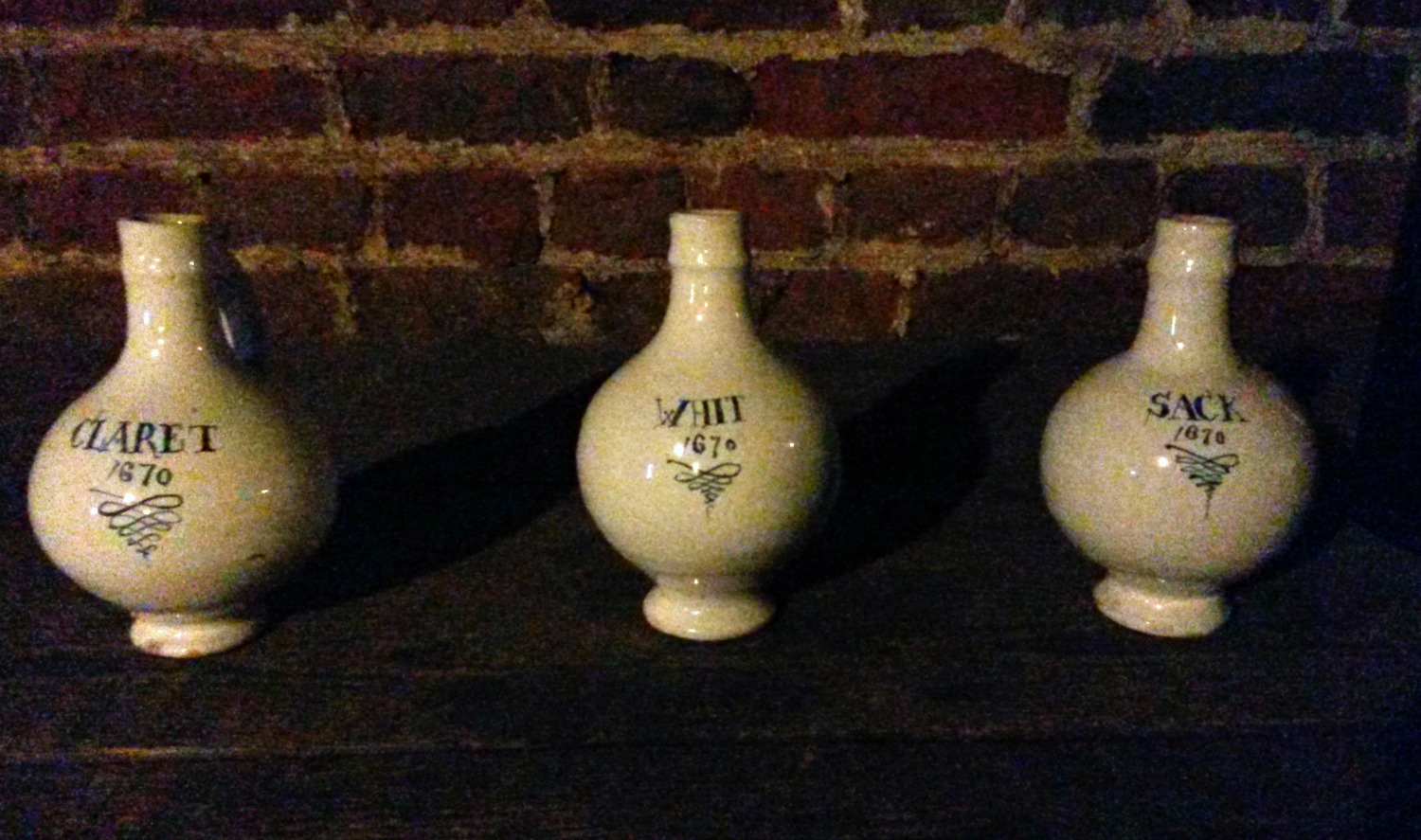 Ceramic wine holders in the beer cellar of Ham House in Surrey
