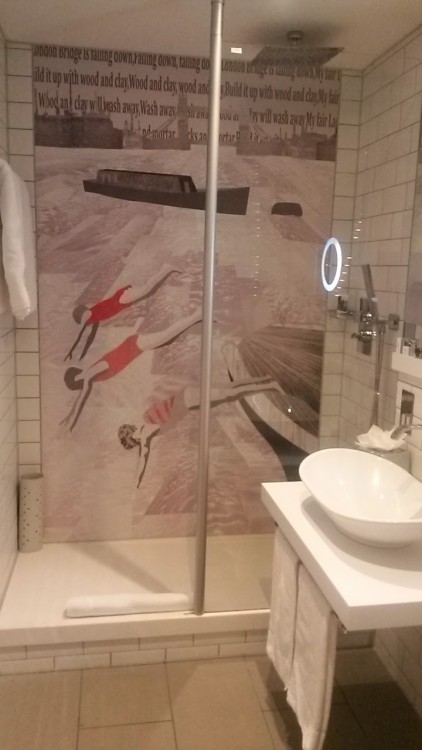 Diving women decorating the shower wall in the bathroom at the Mercure London Bridge hotel - my review