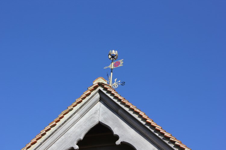 Weathervane atop a roof in Carisbrooke Castle on the Isle of Wight