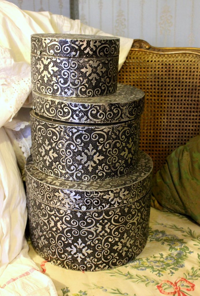 Decorative hat boxes from a bedroom left as if during an Edwardian house party - visiting Warwick castle with a toddler