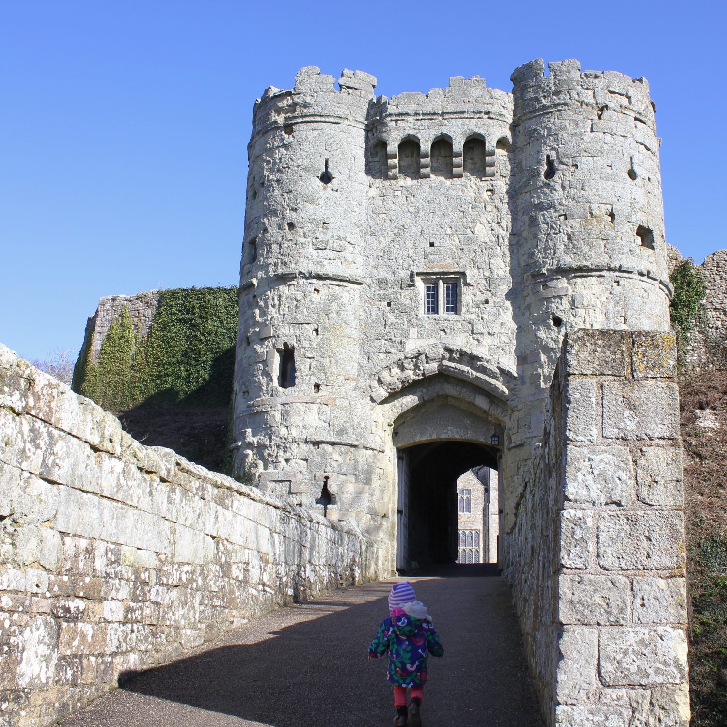My daughter walks into Carisbrooke Castle on the Isle of Wight