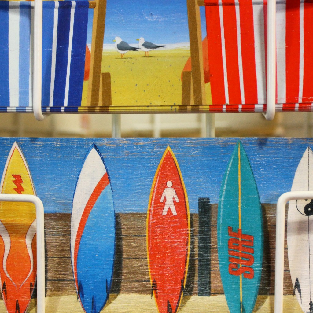 Postcard from the Isle of Wight showing beach and surfboards