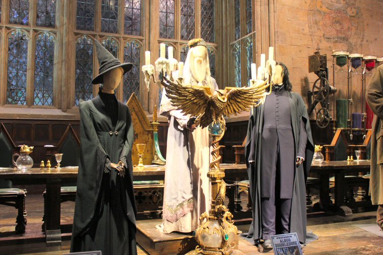 Costumed models of Professor McGonagall, Dumbledore and Snape in the Great Hall of Hogwarts set on the Harry Potter studio tour