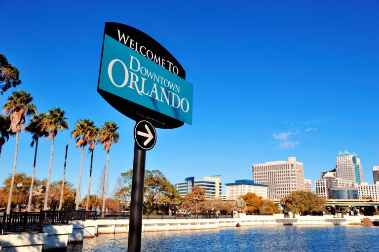 Sign pointing to Downtown Orlando at Lake Lucerne - a visit is one of my top things to do in Orlando with kids