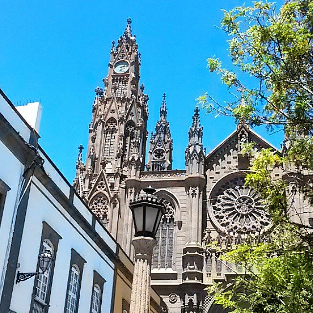 Exterior of the church of San Juan Bautista with its rose window in Arucas, Gran Canaria