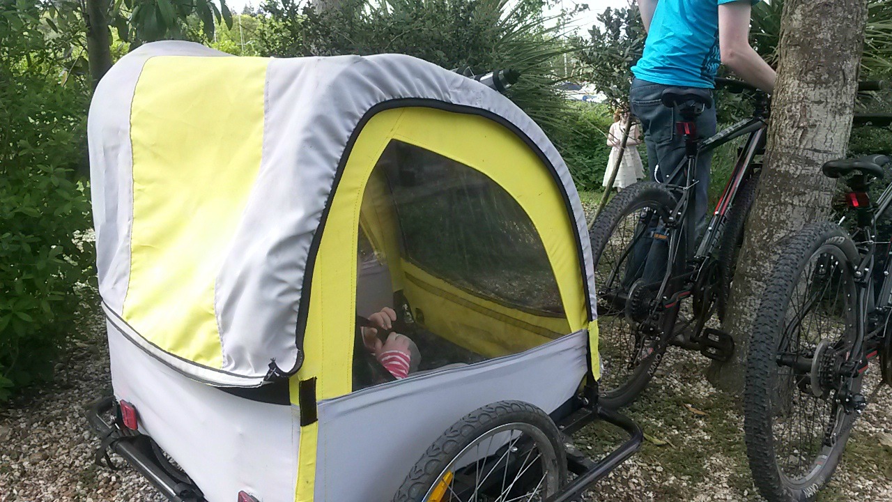Bike trailer for my daughter, pulled by my husband - part of our New Forest bike hire on an active holiday with kids