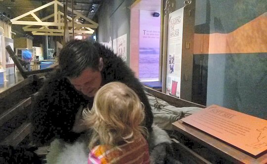 Dressing up on board The Walrus replica Viking boat at the National Maritime Museum Cornwall