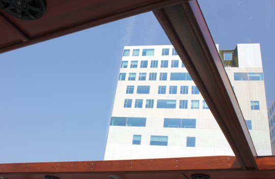 White building seen from our canal boat tour of Amsterdam