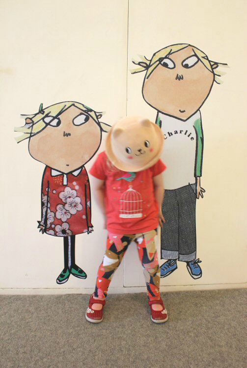 My daughter with pictures of Charlie and Lola at the Lauren Child exhibition at Mottisfont, Hampshire