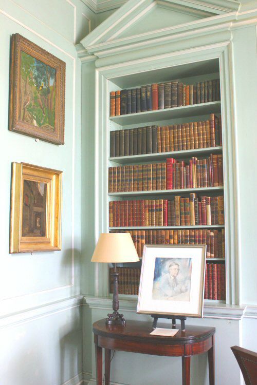 Shelves of books at Mottisfont