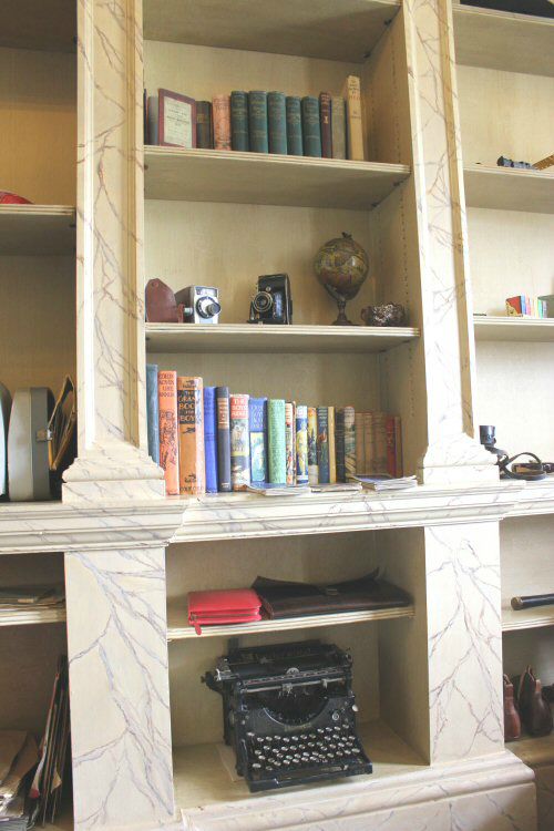 Display of books and knick knacks in the house at Mottisfont