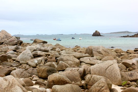 View across the rocks to the beach and sea of St Agnes - my reasons to visit the Isles of Scilly