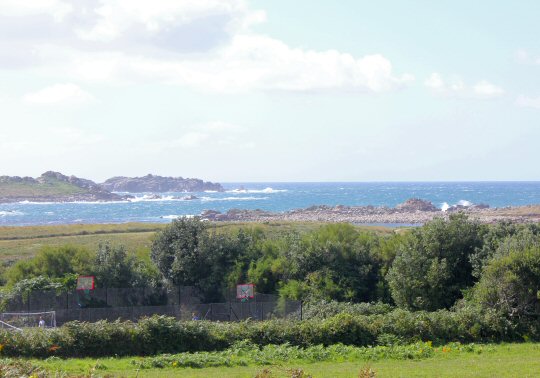 View down to the waves off one coast of Bryher - my reasons to visit the Isles of Scilly