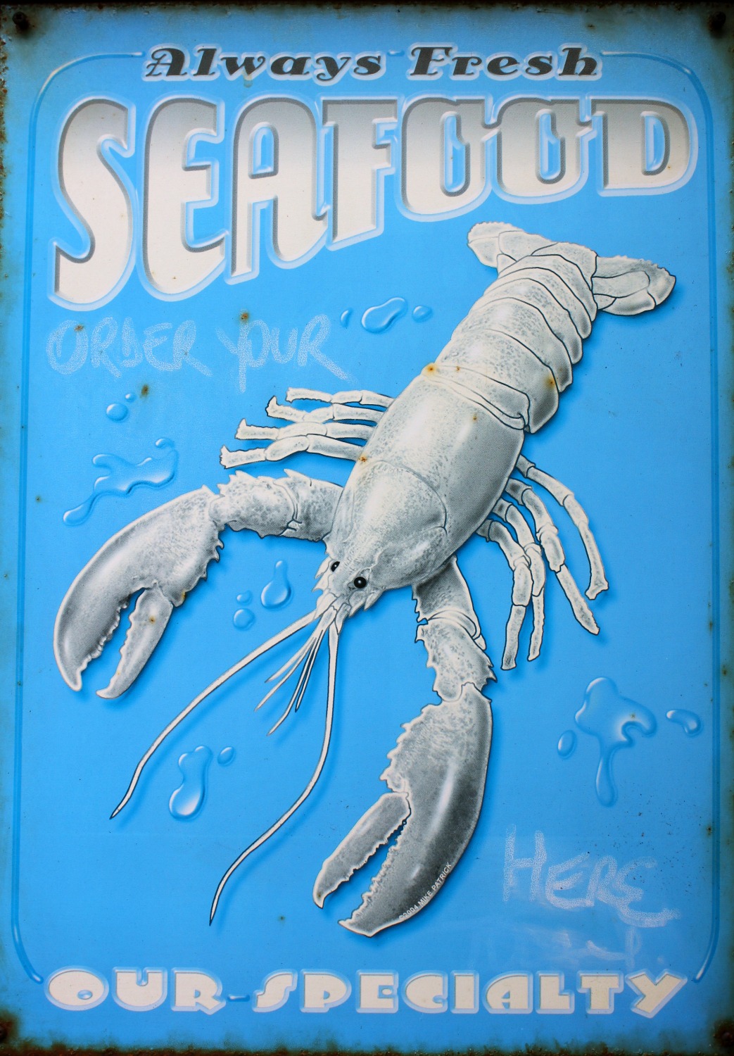 A vintage style sign for seafood on St Mary's - reasons to visit the Isles of Scilly
