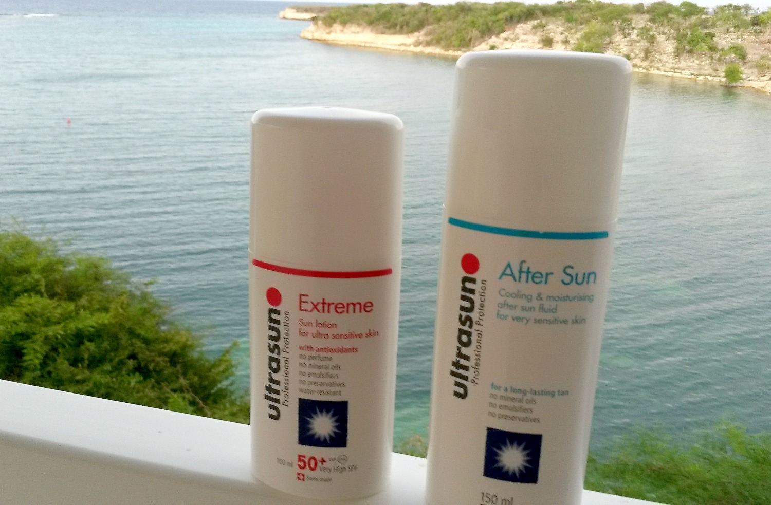 Bottle of Ultrasun SPF and aftersun on the balcony of our room at Verandah resort in Antigua