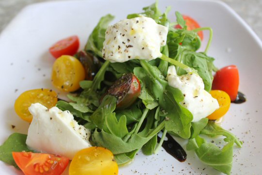 Burrata and heirloom tomato salad at the Sandbar restaurant