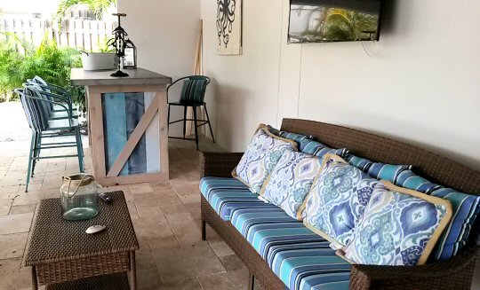 Outdoor living area of Serenity Beach house, one of the Anna Maria Island holiday homes