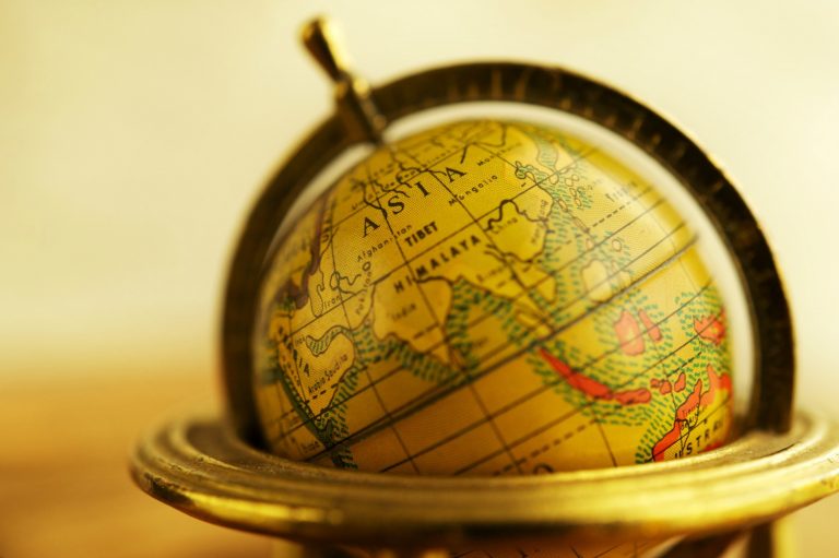 Vintage globe spun around to show part of Asia, as my own travel tally reaches 60 countries