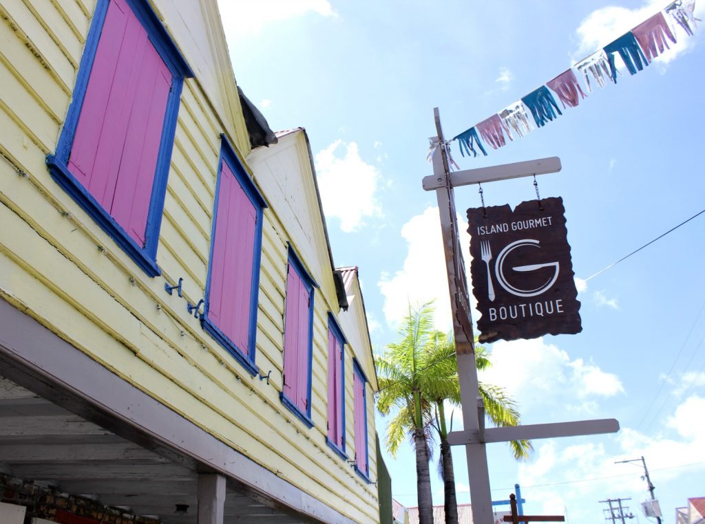 Brightly coloured buildings in St John's on Antigua - 14 reasons to visit Antigua with young kids