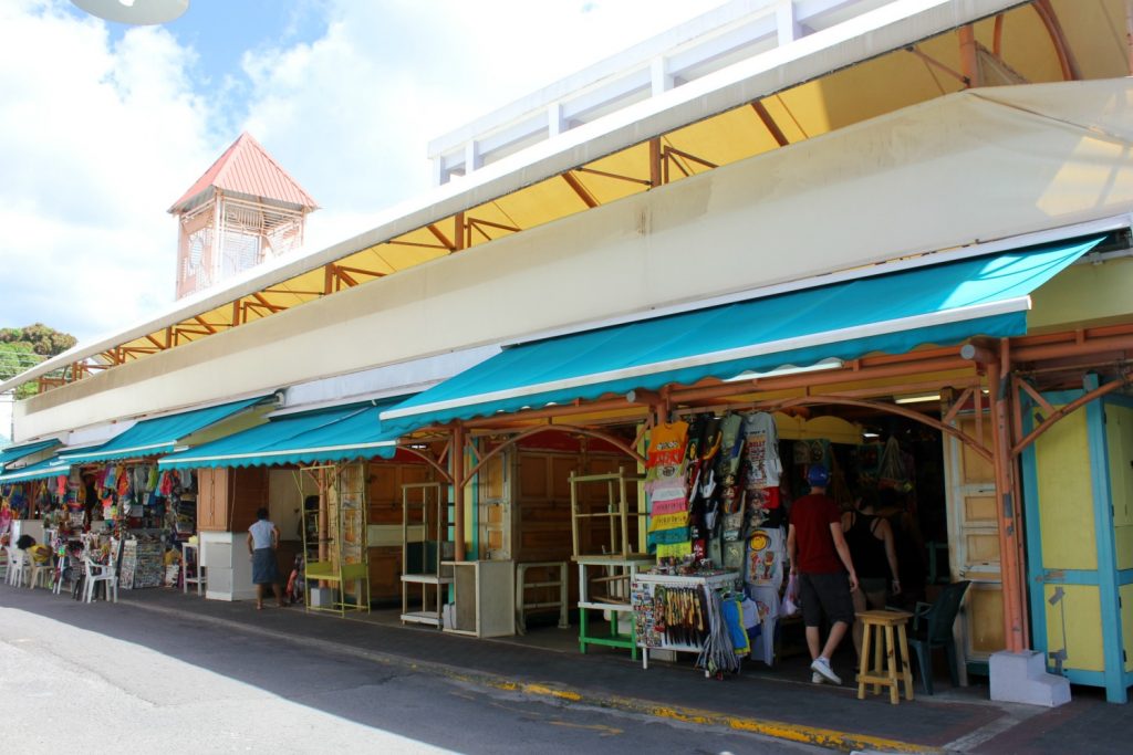 Brightly coloured buildings in St John's on Antigua - 14 reasons to visit Antigua with young kids