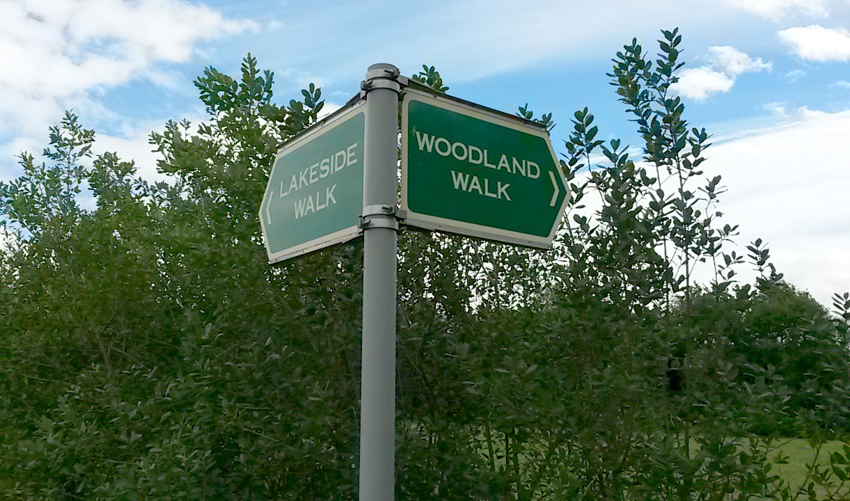 Sign pointing the way around the lakeside Room on the Broom walk in Yorkshire