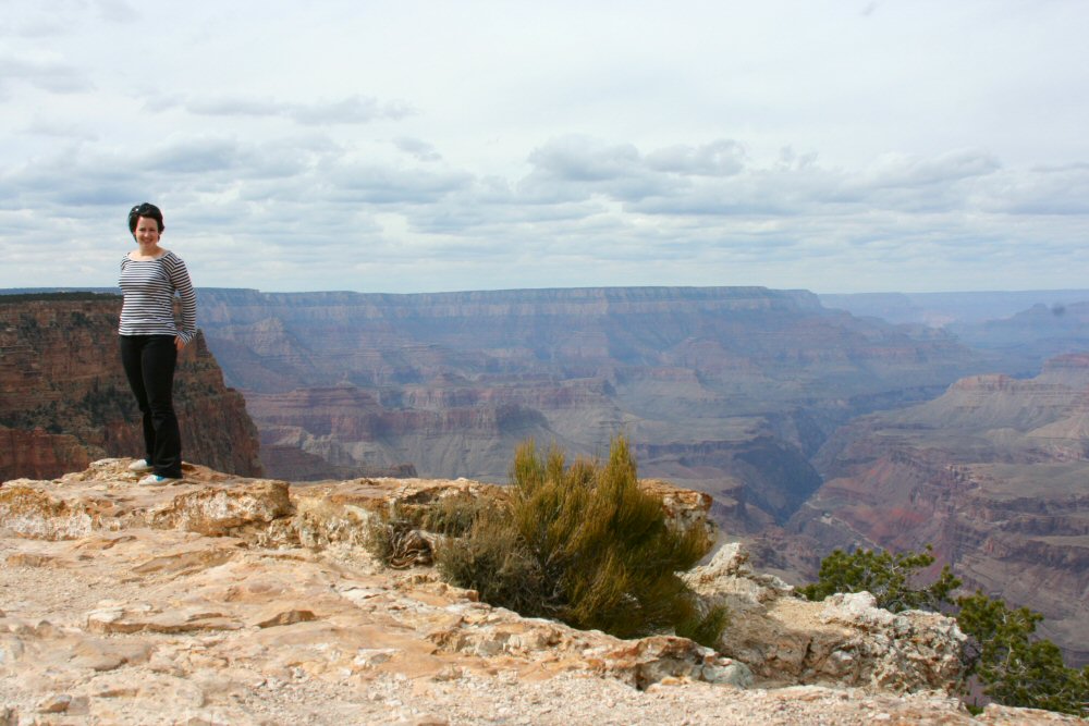 My standing on the cliff at the edge of the Grand Canyon