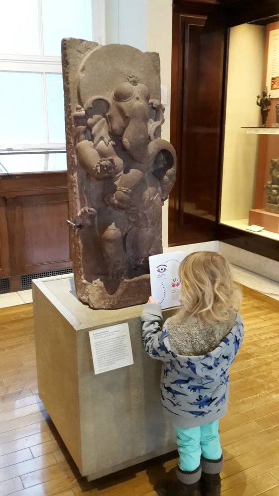 My daughter tracks down Ganesh in one of the Asia galleries as we followed the British Museum activity trail - visiting the British museum with kids