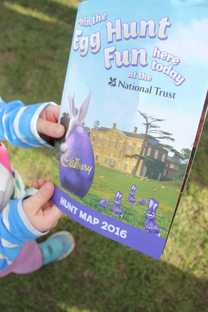 My daughter holds the map for the Cliveden Easter Egg hunt - one of the National Trust easter egg trails around the country. My review of a fun family day out