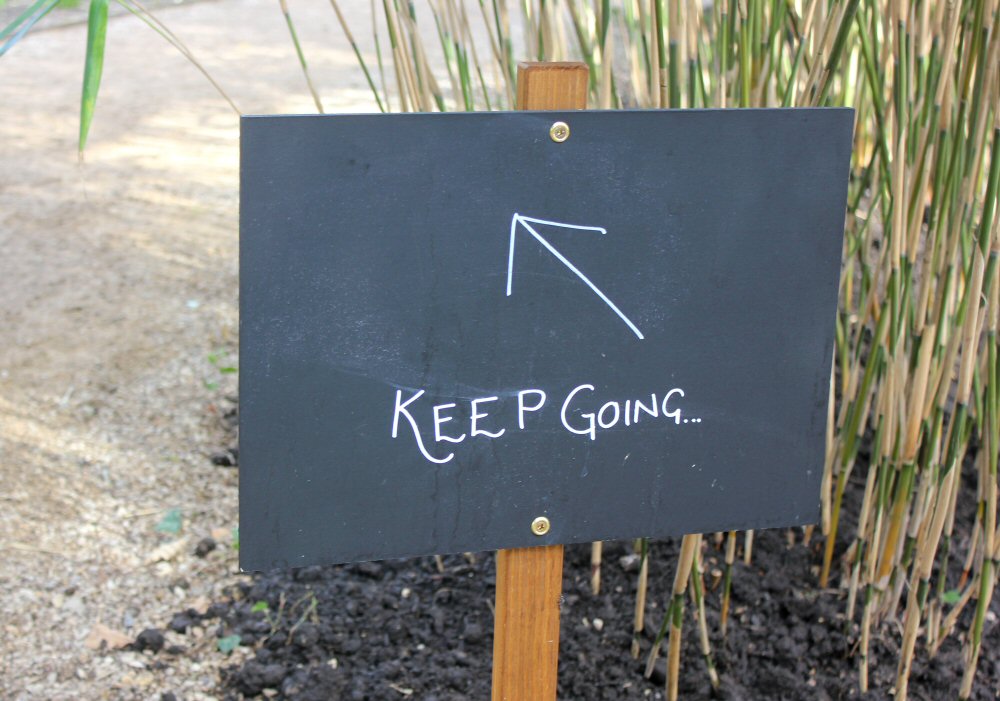 Blackboard sign saying keep going at the Cliveden Easter Egg hunt