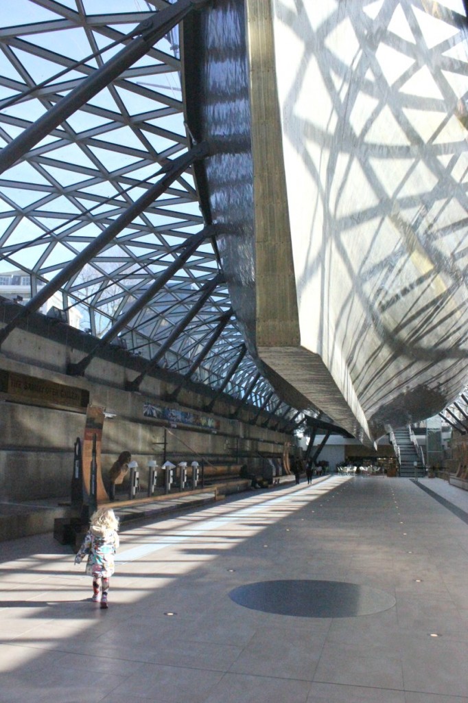My daughter looks at the hull of the Cutty Sark in Greenwich