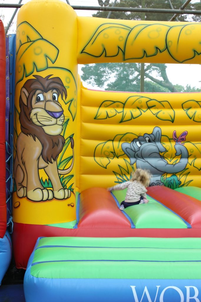My daughter on the bouncy castle at Woburn Safari Park in Bedfordshire